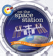 On the Space Station (Shine-a-light) Hardcover – Picture Book